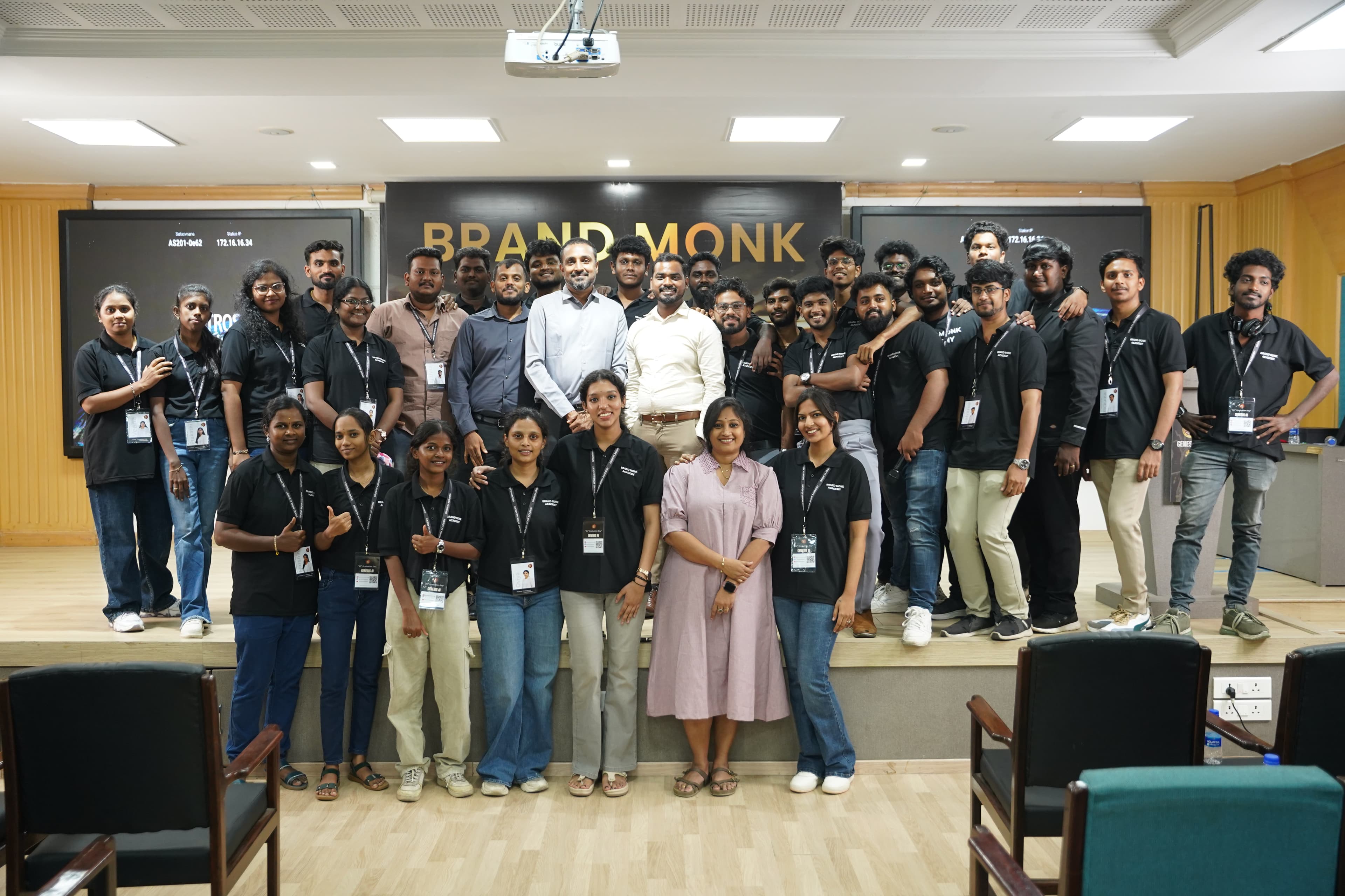 Brand Monk Academy students and faculty on stage